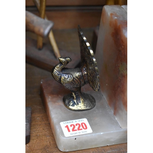 1220 - A pair of brass and onyx peacock bookends, 12cm high; together with three rootwood sculptures, ... 