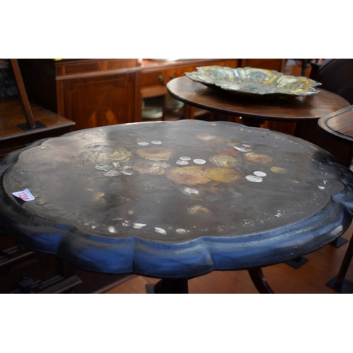 1234 - A Victorian papier mache tilt top tripod table, 65.5cm wide. 