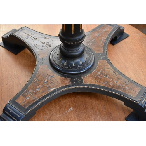 1240 - A Victorian ebonized and burr walnut book table, 73.5cm high. 