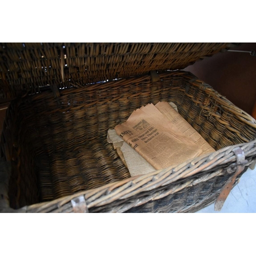 1244 - An old wicker basket, 69cm wide. 