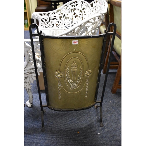 1867 - A late Victorian steel and brass fire screen, 47.5cm wide.