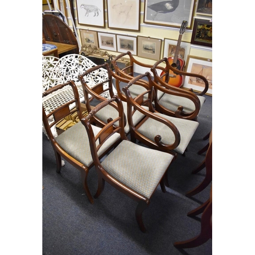 1868 - A set of six reproduction, Regency style, sabre leg dining chairs, to include a pair of elbow chairs... 