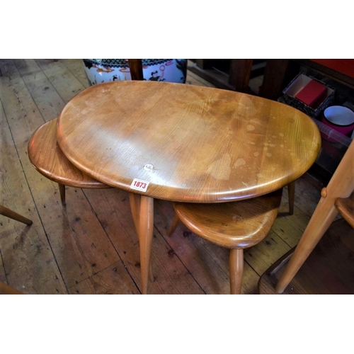 1873 - A nest of three vintage blonde Ercol pebble tables. 