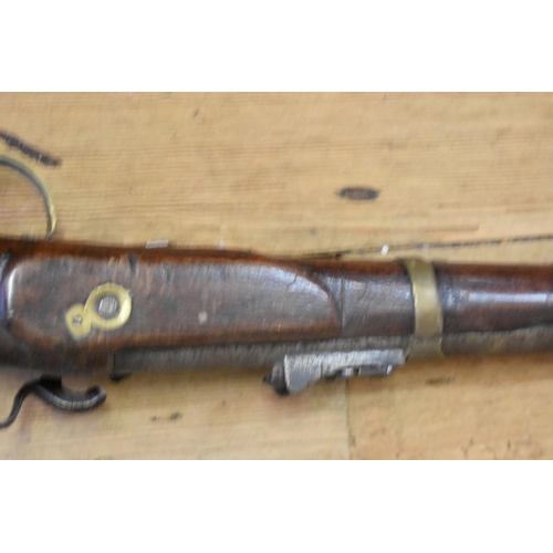 1912 - An antique muzzle loading percussion musket.