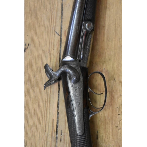 1915 - A J D Dougall's patent lockfast double barrelled pin fire black powder shotgun.