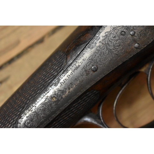 1915 - A J D Dougall's patent lockfast double barrelled pin fire black powder shotgun.