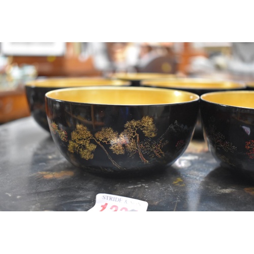 1181 - A set of six Chinese lacquer bowls, 12cm diameter, in pine box; together with two Victorian Stafford... 