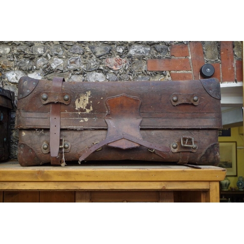 1006 - Two vintage tan leather suitcases, the largest by 'Drew & Sons', 91.5cm wide.