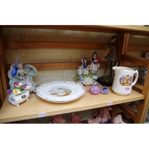 1025 - A mixed group of pottery and porcelain, to include Nat West piggy banks. (two shelves)... 