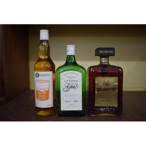 85 - A 1 litre bottle of Disaronno; together with a 1 litre bottle of Grosvenor gin; and a 70cl bottle of... 