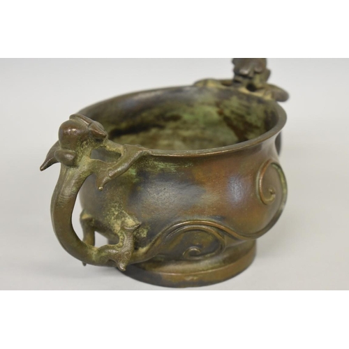 615 - WITHDRAWN FROM SALE: A Chinese Archaistic bronze twin handled censer, with lingzhi dragon handles, 1... 