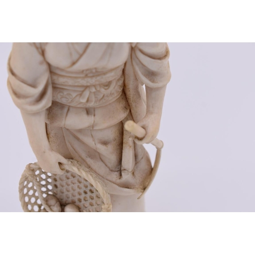 642 - A Japanese carved ivory okimono of a lady gardener, Meiji, signed to base, 20.5cm high.... 