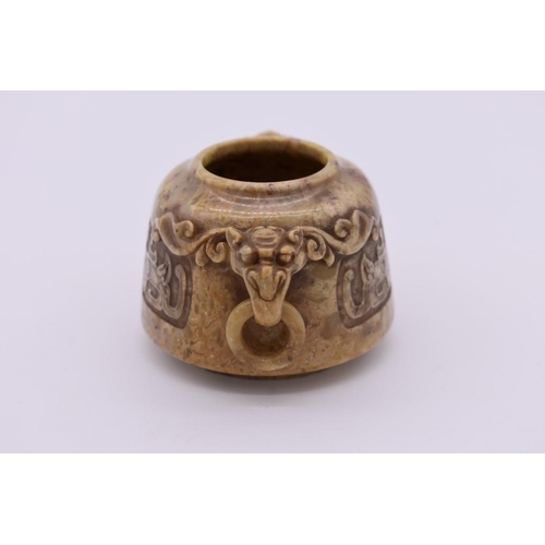 656 - A Chinese puddingstone style twin handled brush pot, 10cm diameter.