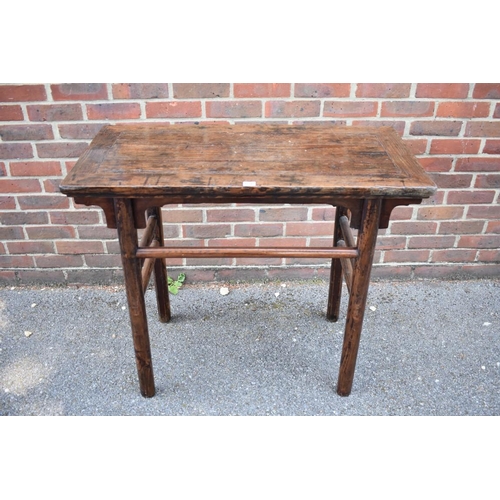 676 - An antique Chinese elm alter table, 99cm wide, possible alterations to frieze. ... 