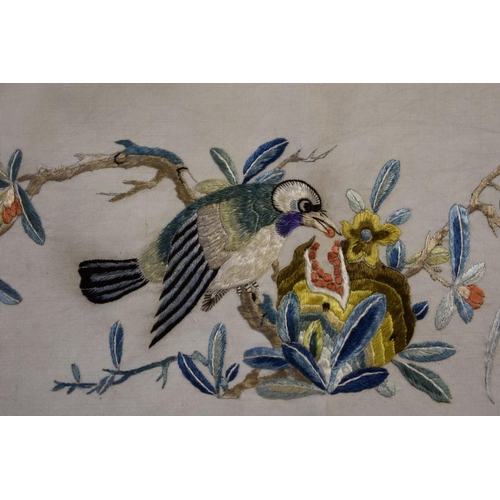 679 - A Chinese silk embroidered panel of birds and butterflies, 64.5 x 36.5cm. 