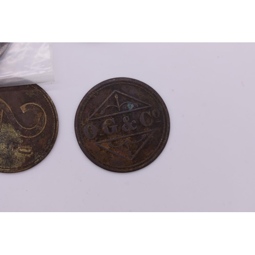 420 - Coins: Four O.G & Co (Osborne Garret & Co) British South Africa 2d tokens, together with a 1... 