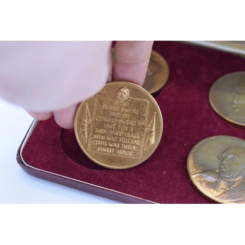 424 - A limited edition cased set of four bronze 'The Churchill Medals', by John Pinches, with certificate... 