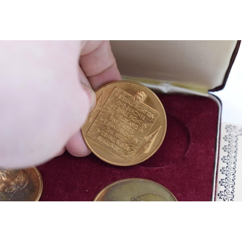 424 - A limited edition cased set of four bronze 'The Churchill Medals', by John Pinches, with certificate... 