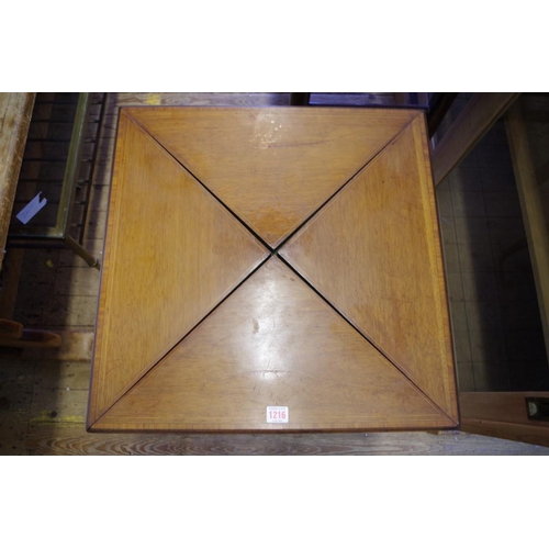 1083 - A circa 1900 mahogany, line inlaid and crossbanded envelope card table, with frieze drawer, 55.5cm w... 