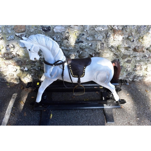 1063 - A child's rocking horse.This lot can only be collected on Saturday 1st August (10-2pm)... 