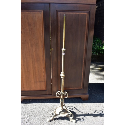 1070 - An old brass standard lamp. (missing fittings).This lot can only be collected on Saturday 1st August... 