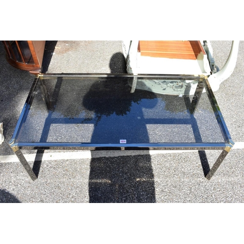 1074 - A modern metal and glass coffee table, 115cm wide.This lot can only be collected on Saturday 1st Aug... 