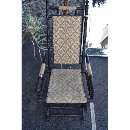 1085 - An antique American rocking chair.This lot can only be collected on Saturday 1st August (10-2pm)... 