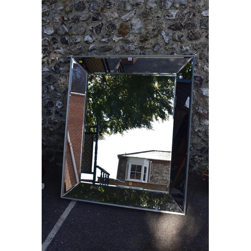 1088 - A large modern bevelled wall mirror.This lot can only be collected on Saturday 1st August (10-2pm)... 