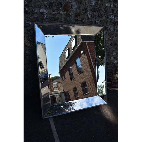 1088 - A large modern bevelled wall mirror.This lot can only be collected on Saturday 1st August (10-2pm)... 