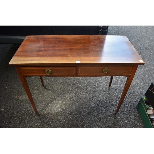 1090 - An Edwardian mahogany and line inlaid two drawer side table, 107cm wide.This lot can only be collect... 