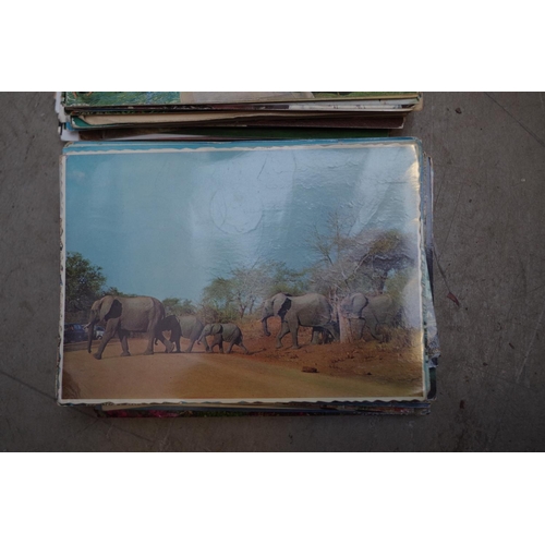 1329 - A quantity of early 20th century and later postcards, to include a few of World War I interest.&nbsp... 