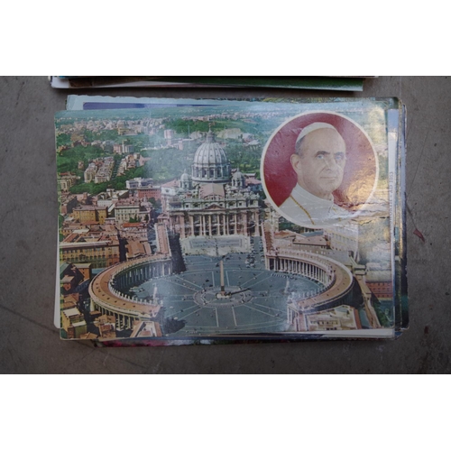 1329 - A quantity of early 20th century and later postcards, to include a few of World War I interest.&nbsp... 