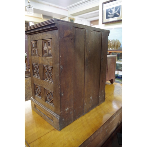 1459 - A good and unusual oak miniature chest, stamped 'B Shepherd', having two short and three long drawer... 