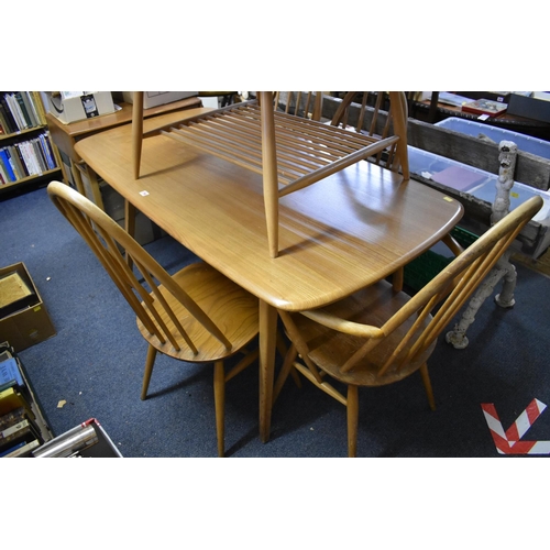 1756 - A vintage Ercol 'Blonde' dining table, 152cm, together with five Ercol dining chairs.... 