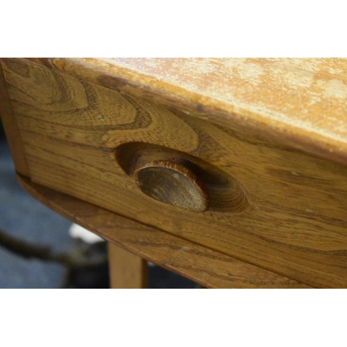 1758 - A vintage Ercol elm single drawer desk, 68cm wide.