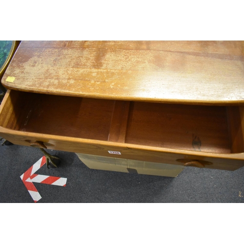 1758 - A vintage Ercol elm single drawer desk, 68cm wide.