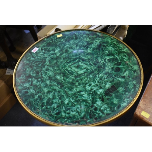 1760 - A 19th century brass mounted malachite circular table top, 54cm diameter.