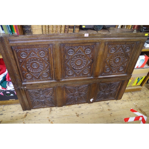 1762 - A section of carved oak panelling, 128cm by 91cm. 