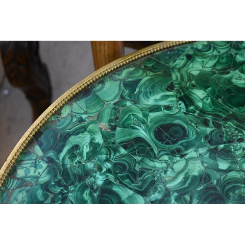 1760 - A 19th century brass mounted malachite circular table top, 54cm diameter.