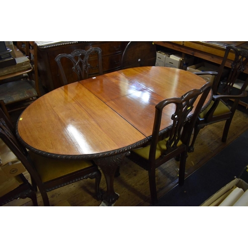 1765 - A circa 1900 mahogany dining suite, comprising: an extending dining table, 180cm extended, a serpent... 