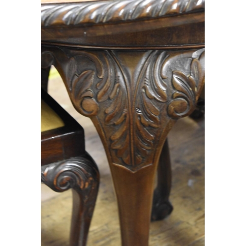 1765 - A circa 1900 mahogany dining suite, comprising: an extending dining table, 180cm extended, a serpent... 