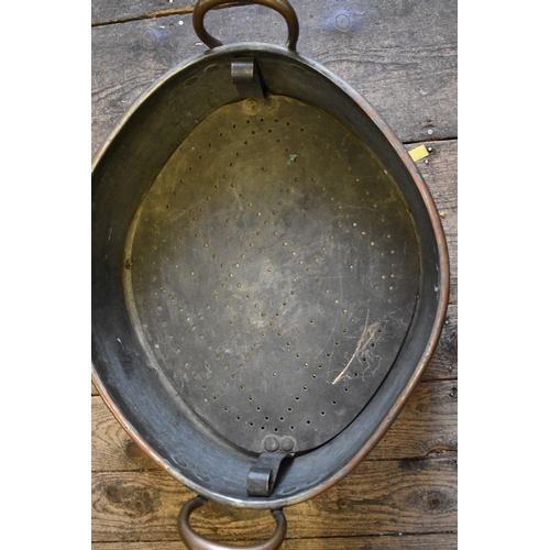 1792 - A 19th century copper twin handled turbot kettle and cover, with internal tray, engraved 'B.P Lon', ... 