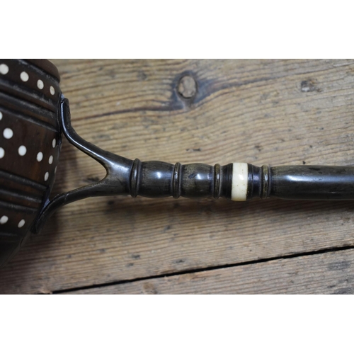 1416 - An unusual wooden and horn ladle, having bone inlay; together with a wooden gavel; and two old corks... 