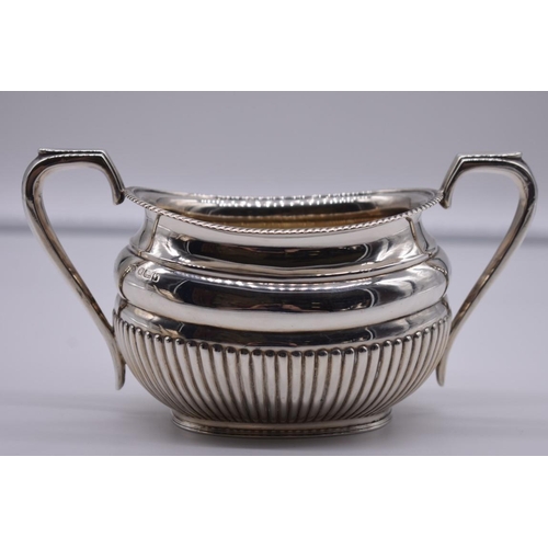 34 - A Victorian silver three piece tea & coffee set, by Harrison Brothers & Howson, Sheffield 18... 