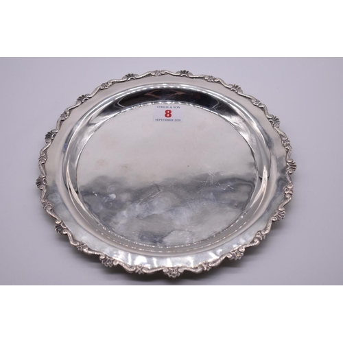 8 - A Continental .900 silver salver, 24cm diameter.