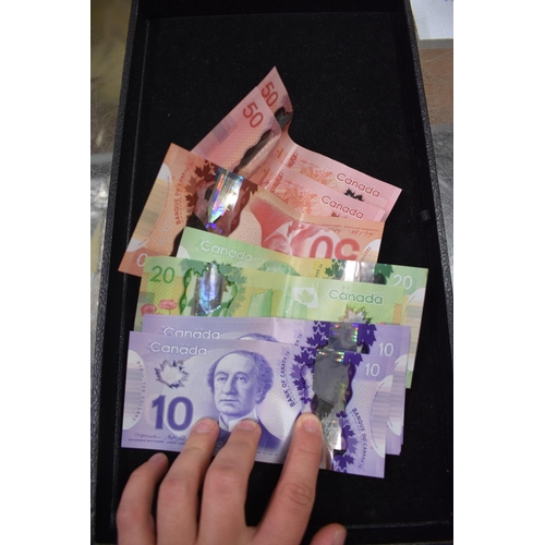 308 - Banknotes: a quantity of World notes; to include 240 Canadian dollars; U.S dollars; Jersey and Guern... 