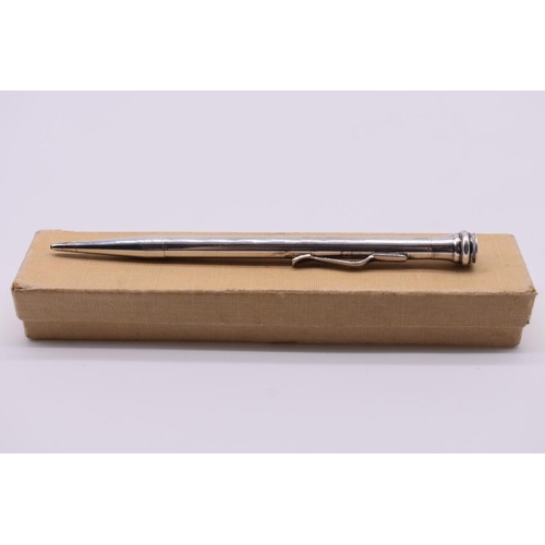 61 - A sterling silver propelling pencil, 11.5cm long.