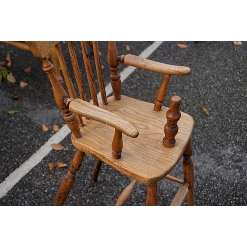 1060 - A child's beech and elm high chair. This lot can only be collected on Saturday 19th December (9-2pm)... 