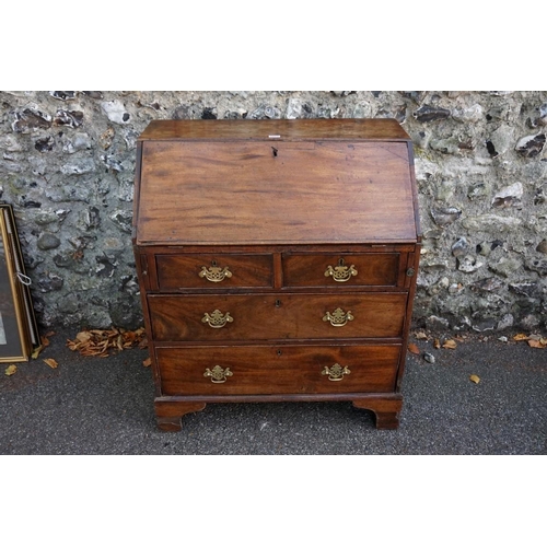 1071 - A mahogany and oak bureau, 91cm high x 76cm wide x 43.5cm deep. This lot can only be collected on Sa... 