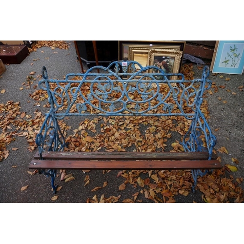 1074 - A blue painted cast iron garden bench. This lot can only be collected on Saturday 19th December (9-2... 